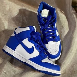 Blue and white high top Nike dunks